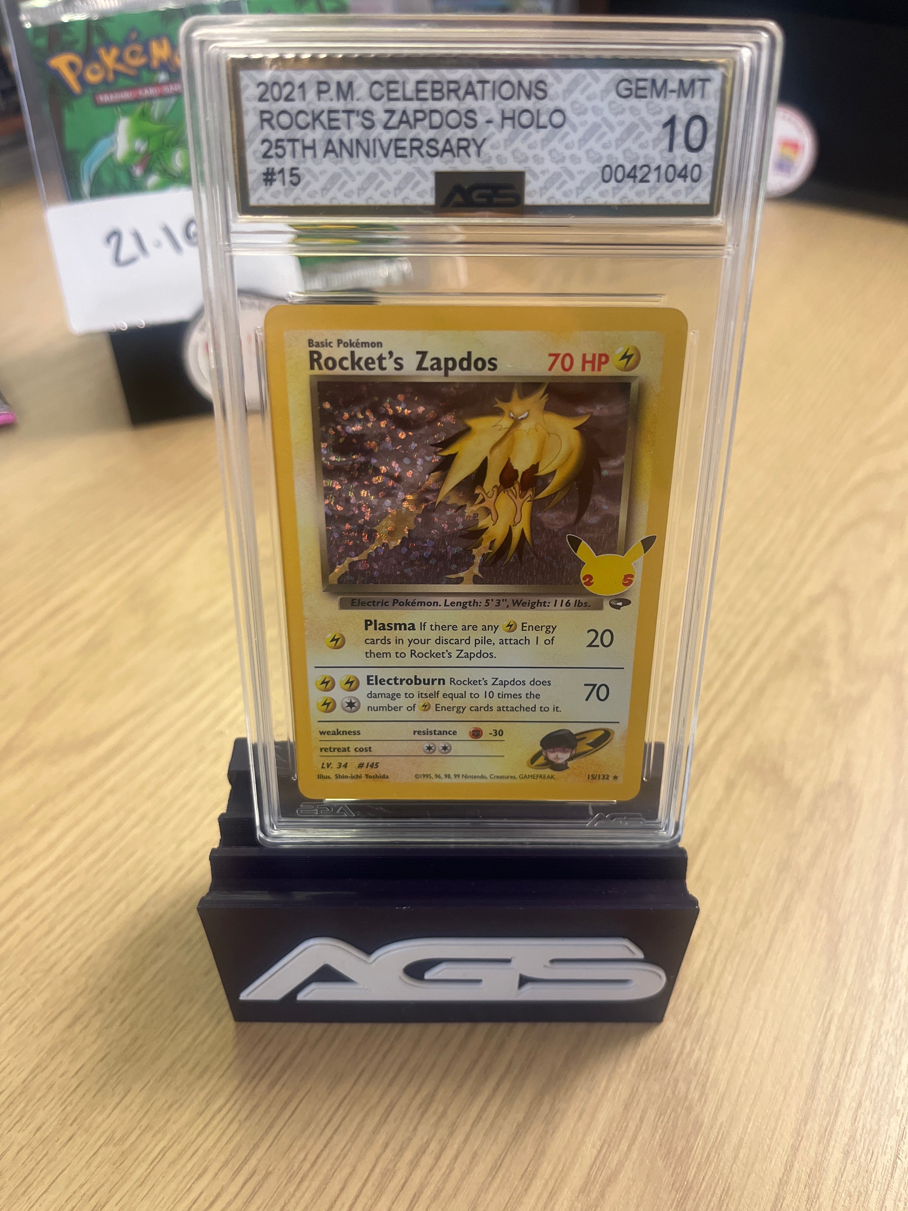 Pokemon Rocket's Zapdos 15/132 Celebrations English Holo AGS 10 (2021) Pokemon Rocket's Zapdos 15/132 Celebrations English Holo AGS 10 (2021)